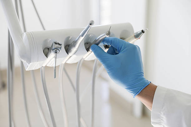 Professional Root Canal Treatment technician working in Rancho Alegre, TX